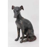 Patinated metal sculpture of a greyhound
