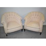 Pair of early 20th century button upholstered tub chairs