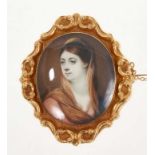 Good quality 19th century portrait miniature of a lady, in gold brooch mount