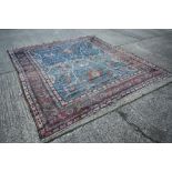 Old Persian carpet retailed by Maple & Co. London