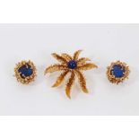 18ct gold flower shaped brooch set with a lapis lazuli sphere to the centre, together with a pair of