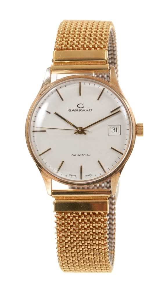 1980s Gentlemen's Garrard Automatic calendar wristwatch with silvered dial, baton hour markers and g