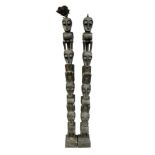 Pair of African carved wooden totem poles