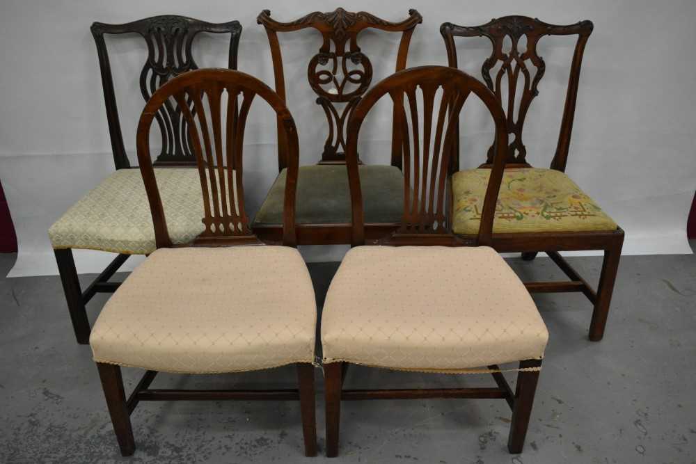 George III carved mahogany dining chair and four others