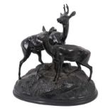 Russian cast iron sculpture of two deer, on naturalistic base, 35cm long