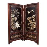 Fine quality Japanese Meiji period hardwood and shibyama inlaid two fold screen, with ornate panels