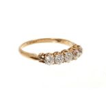 Late Victorian diamond five stone ring with five graduated old cut diamonds in gold claw setting wit