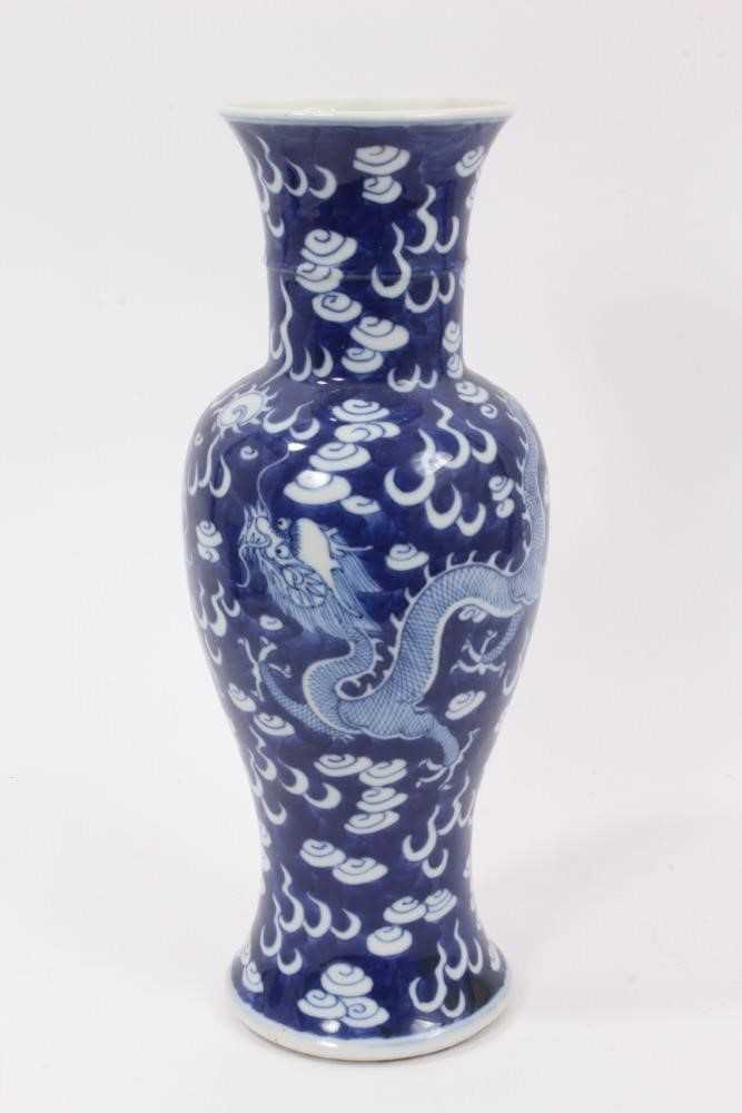Chinese blue and white porcelain vase with dragon decoration and double ring mark to base