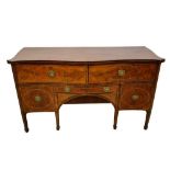 George III mahogany and feather banded serpentine sideboard