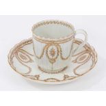 A Worcester fluted gilt decorated coffee cup and saucer, circa 1775