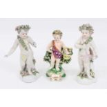 Derby figure of a putto with a basket, circa 1810, and two Derby style figures of putto