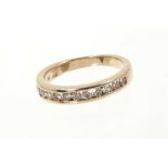 Diamond eternity ring with brilliant cut diamonds in 14ct yellow gold channel setting