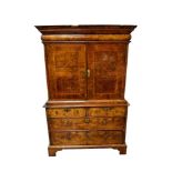 Early 18th century walnut veneered secretaire chest on chest, the top with frieze drawer, fitted int