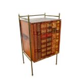 Small novelty cabinet with book spine front