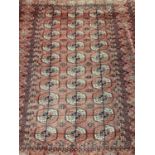Tekke Turkoman rug, having three rows of ten quartered guls, in multiple geometric borders, 147 x 20