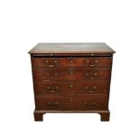 Early George III mahogany dressing chest, with moulded top and brushing slide over four graduated dr