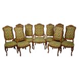 Set of nine Continental carved beech dining chairs