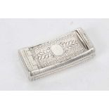 George III silver snuff box of shaped rectangular form, with hinged cover and bright cut decoration