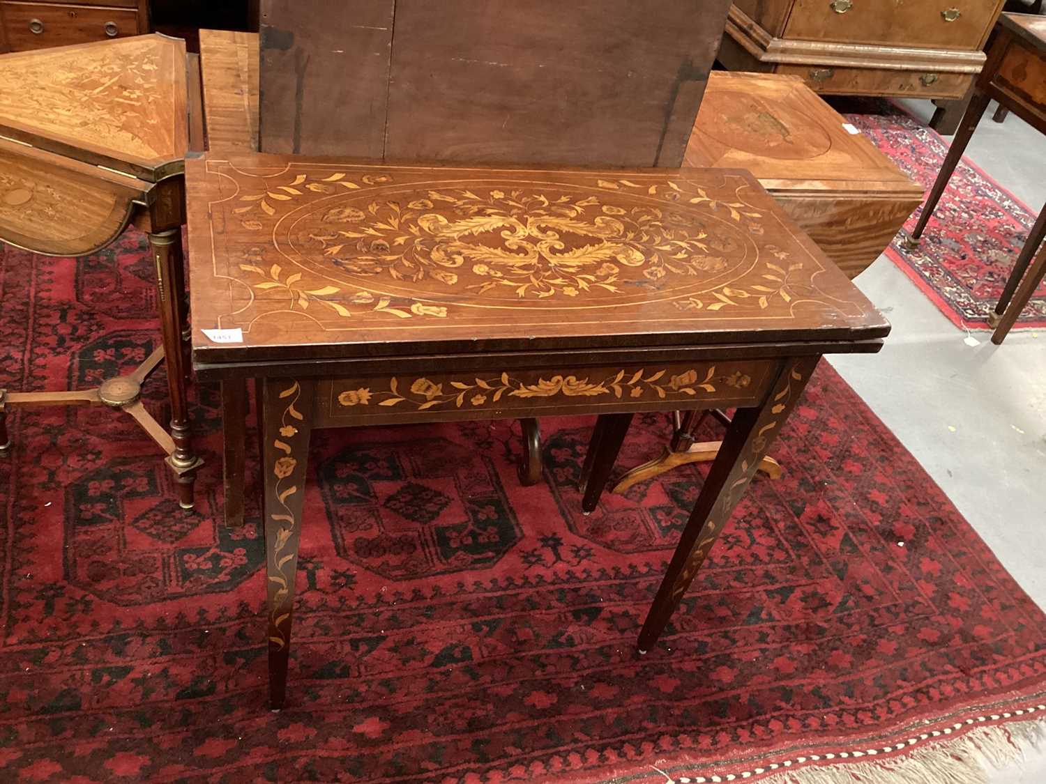 Early 19th century Dutch mahogany and marquetry card table, rectangular fold-over top on square tape