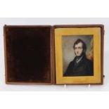 English School, circa 1830, portrait miniature on ivory depicting a young gentleman in black jacket
