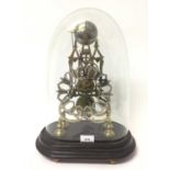 Victorian Gothic skeleton clock, under glass dome.