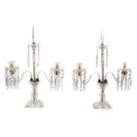 Impressive pair of Regency style twin branch glass candlesticks, each hung with prismatic glass drop