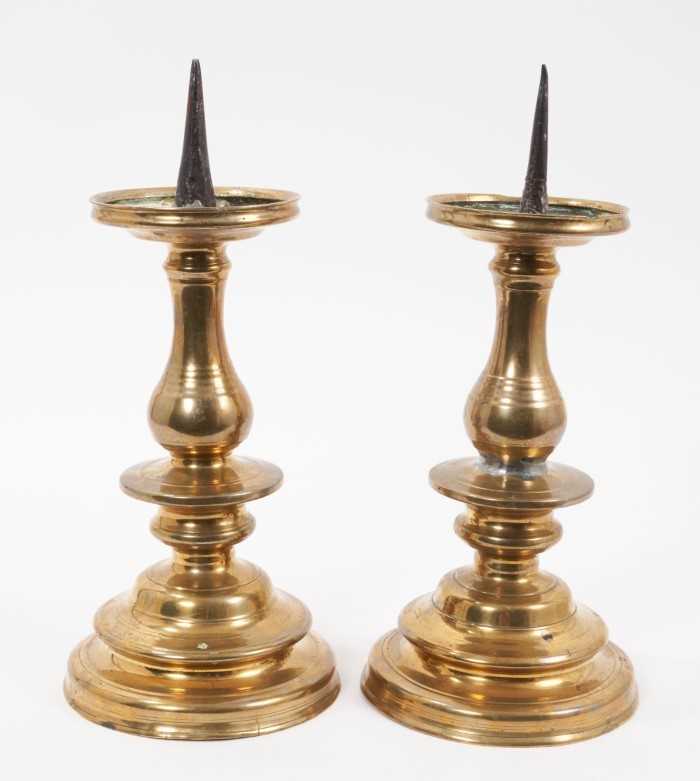 Pair of 17th century brass pricket candlesticks