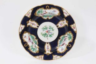 Scarce early 19th century possibly Coalport copy of first period Worcester plate with painted bird a