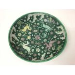 Antique Chinese Qing famille verte porcelain dish painted with horses, precious objects, waves and s