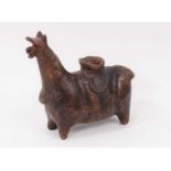 Pre-Columbian pottery figure of a llama, with damage and repair
