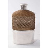 Victorian silver mounted glass hip flask with rattan cover and silver screw fit top, (London 1868)