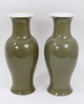 A pair of Chinese dark celadon glazed vases