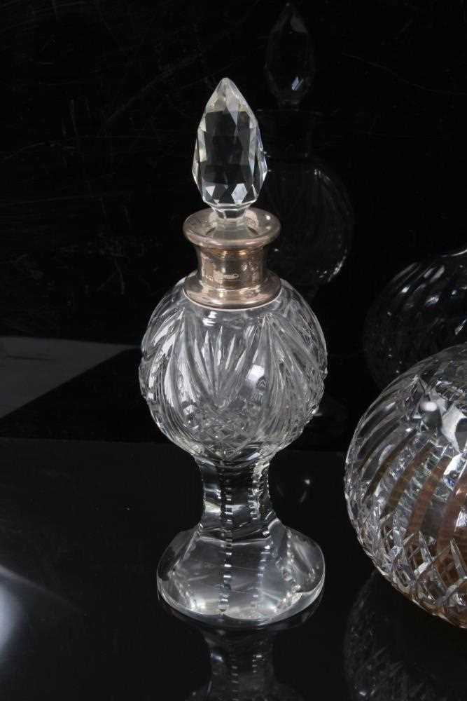 A pair of Webb cut glass shaft and globe decanters, 31cm high, together with a pair of small silver - Image 2 of 6