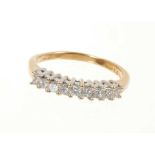 Diamond eternity ring with a half hoop of nine princess cut diamonds in claw setting on 18ct yellow