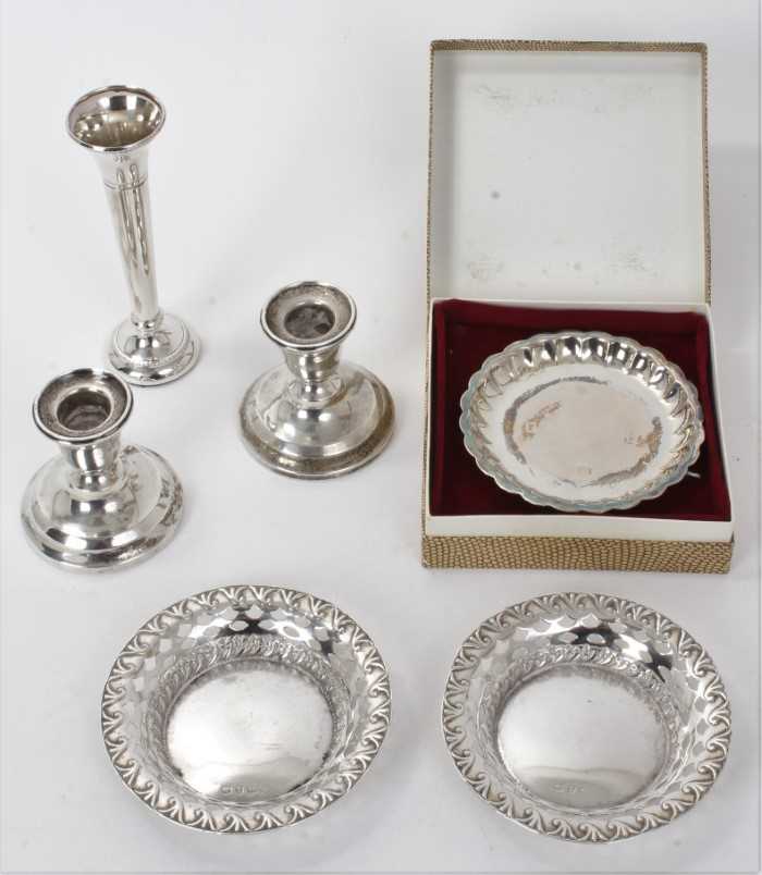 Pair of silver pin dishes, another pin dish in box, a spill vase and pair of silver candlesticks