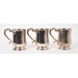 Set of three 1920s silver tankards