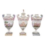 19th century Naples porcelain garniture of three classical vases with ornate moulded and polychrome