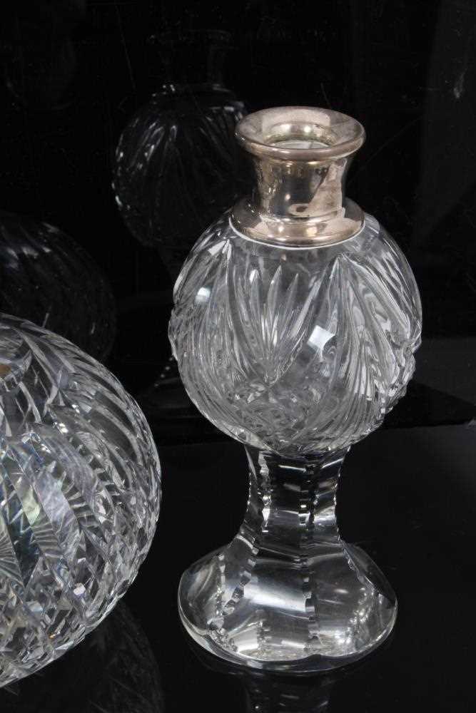 A pair of Webb cut glass shaft and globe decanters, 31cm high, together with a pair of small silver - Image 5 of 6