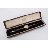 1950's ladies' 9ct gold Garrard & Co wristwatch with silvered dial, gold coloured Arabic numerials a