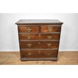 Early 18th century oak chest of drawers, with two short over three long graduated drawers on square