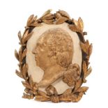 Early 19th century carved oak portrait bust of Louis XVIII in laurel wreath surround