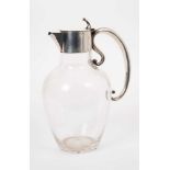 Edwardian silver mounted glass claret jug