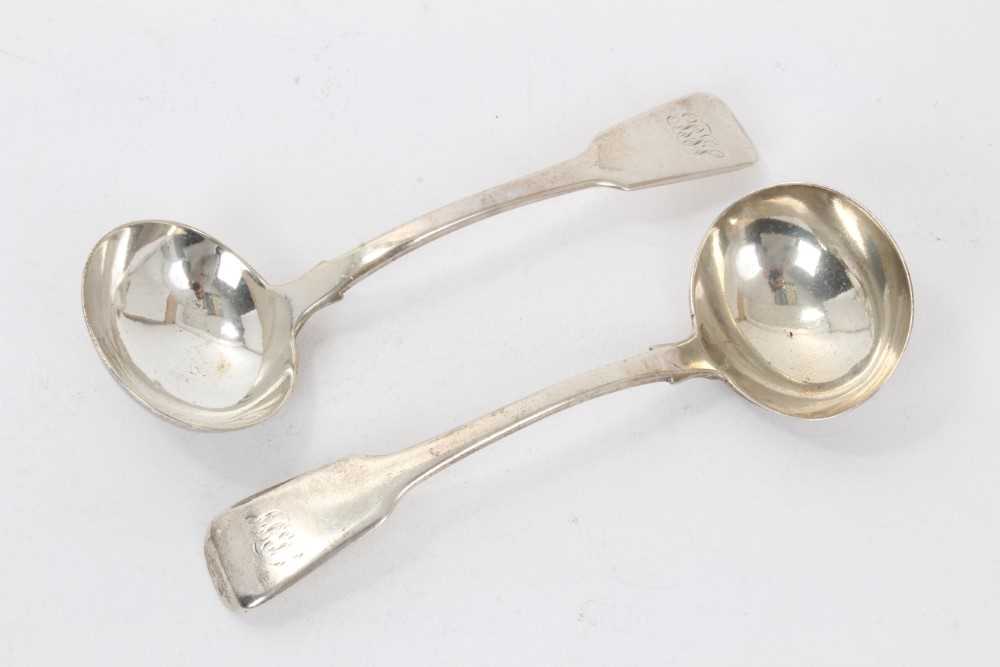Pair William IV silver Fiddle pattern sauce ladles, with engraved initials (London 1835)