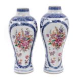 Pair of 18th century Chinese blue and white porcelain vases with polychrome painted decoration.