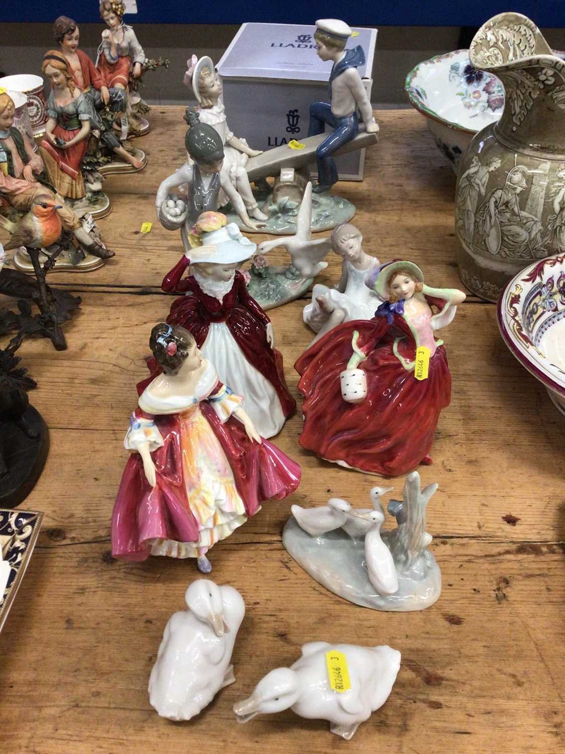 Three Royal Doulton figures and three pieces of Lladro