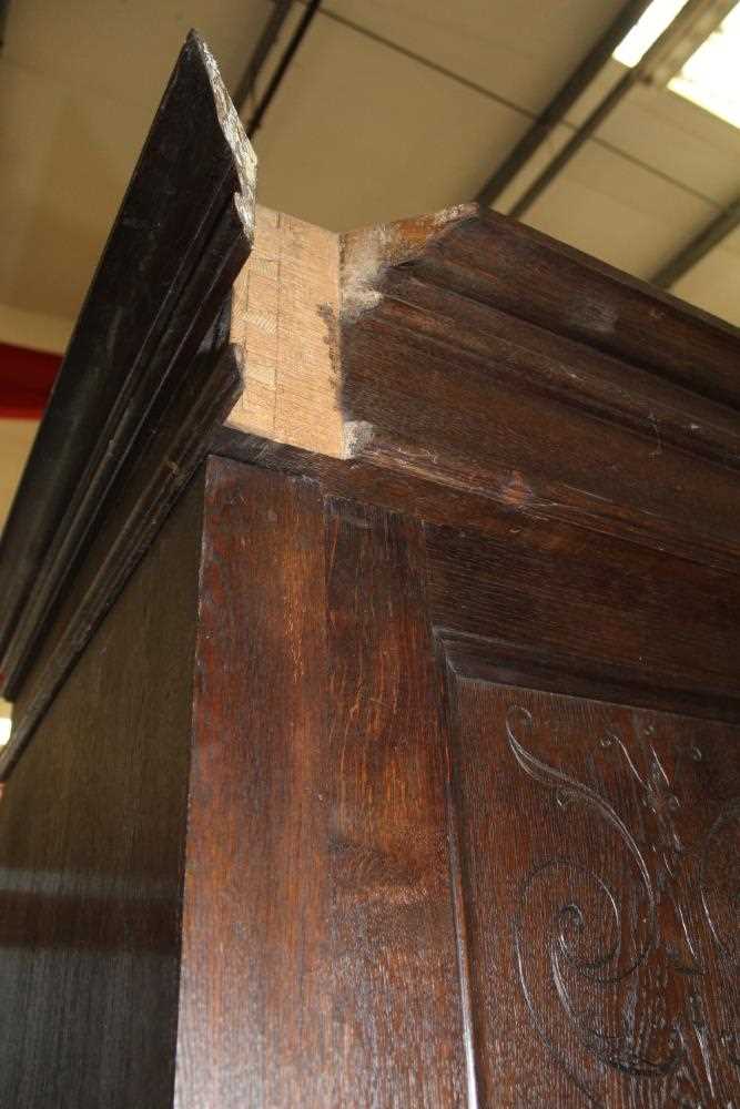 Late 19th / early 20th century Continental carved oak cupboard, enclosed by two pairs of panelled do - Image 4 of 9