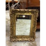 Good quality wall mirror in ornate gilt frame, 54cm x 44cm