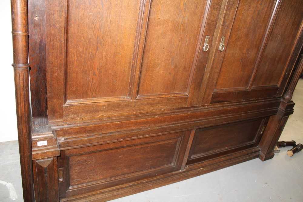 Late 19th / early 20th century Continental carved oak cupboard, enclosed by two pairs of panelled do - Image 5 of 9