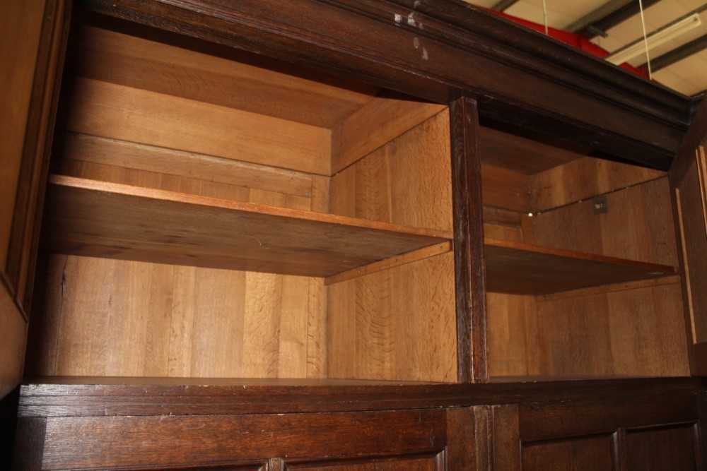 Late 19th / early 20th century Continental carved oak cupboard, enclosed by two pairs of panelled do - Image 3 of 9