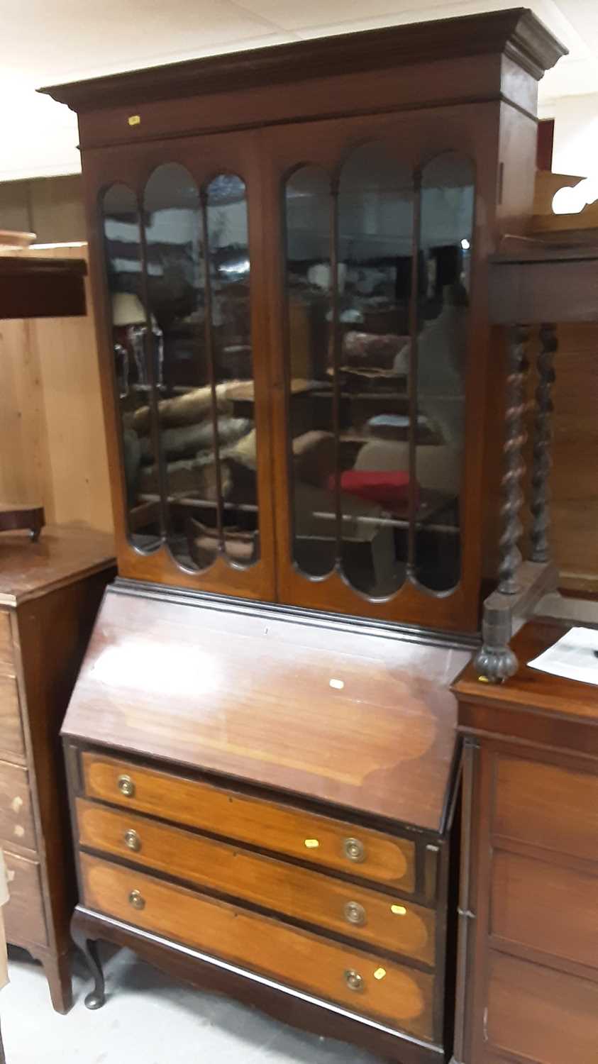 1920's mahogany two height bureau bookcase with shelves above enclosed by two glazed doors, writing